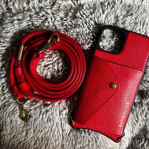Red/Gold Bandolier Hailey crossbody iPhone 13 case. Used once.
